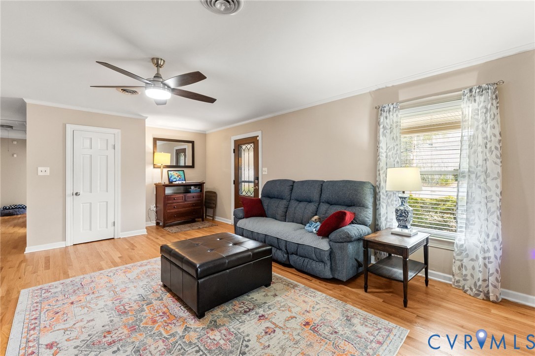 8674 Mary Ball Road Lancaster, VA 22503 - Photo 23 of 38 a living room with furniture and a window