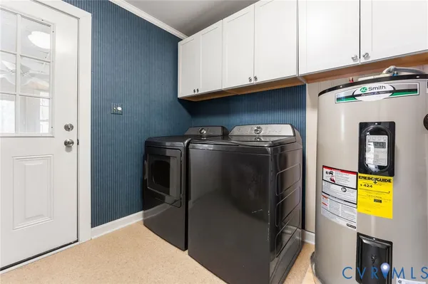 a view of a refrigerator in kitchen and wooden floor