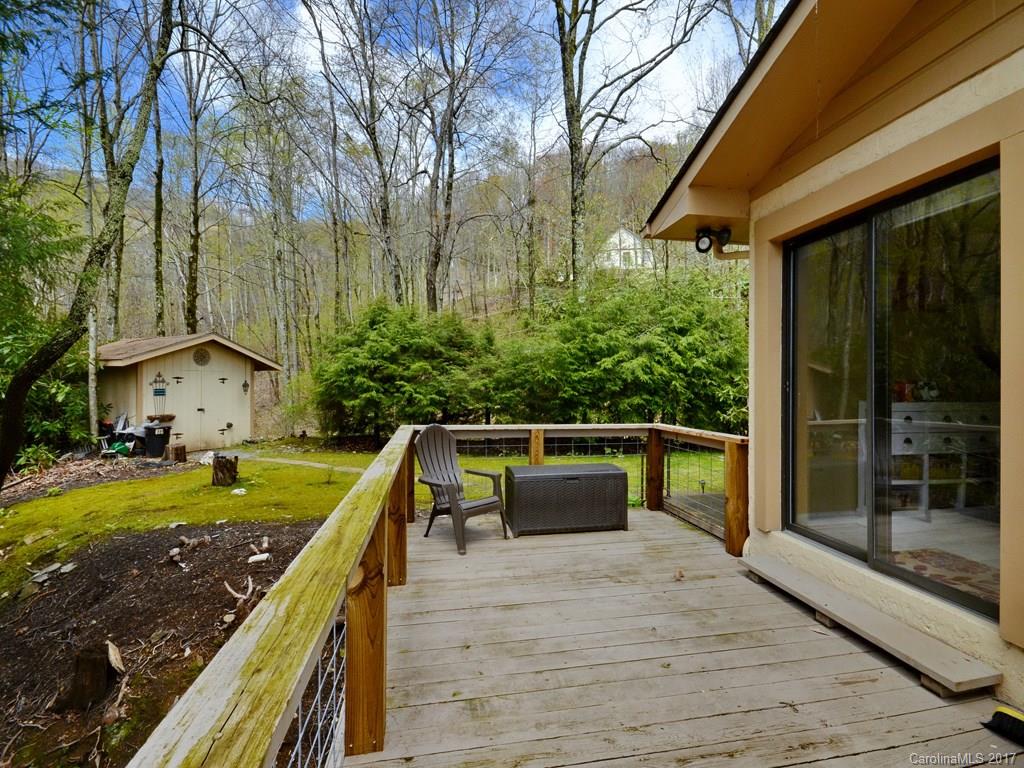 338 The High Road Waynesville, NC 28786 - Photo 5 of 19 a view of swimming pool with lounge chair