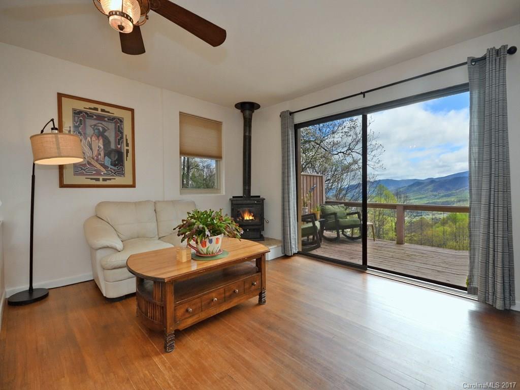 338 The High Road Waynesville, NC 28786 - Photo 7 of 19 a living room with furniture and a large window