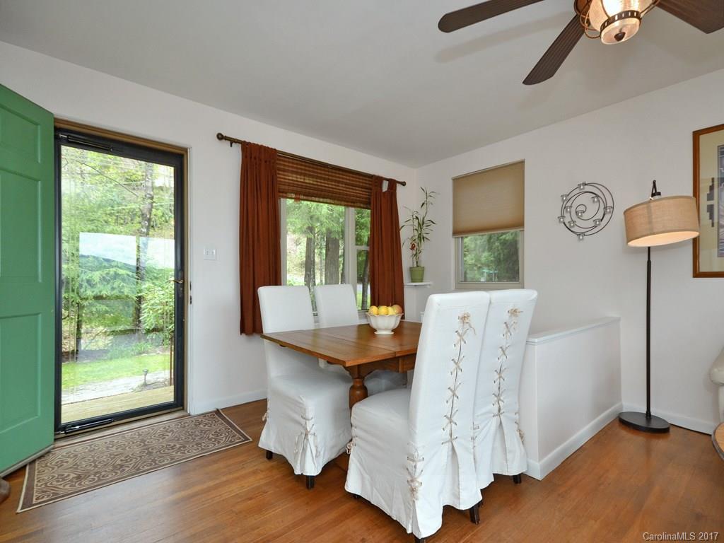 338 The High Road Waynesville, NC 28786 - Photo 8 of 19 a dining room with furniture and window