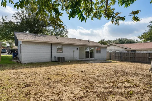 a house view with a garden space