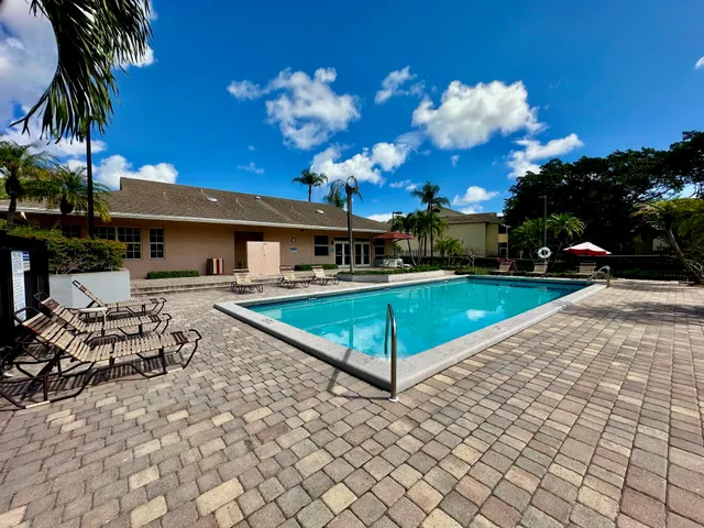 a room with gym equipment and a large window
