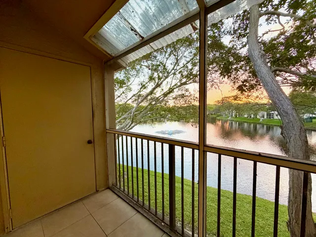 a view of a porch with a large window