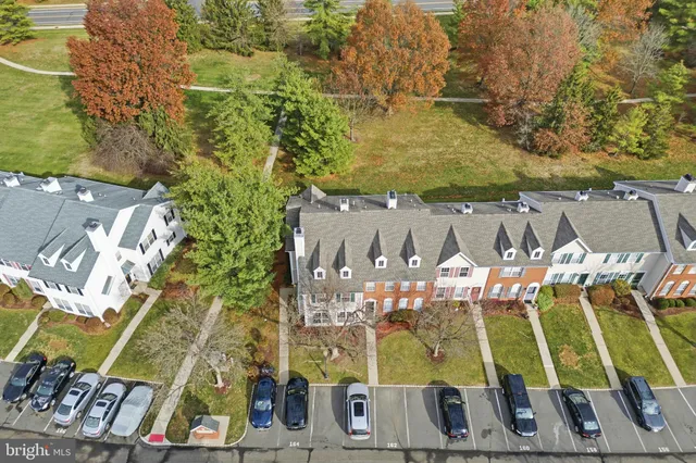 an aerial view of a house with outdoor space