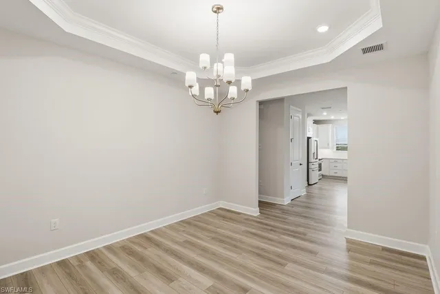 a view of a chandelier in a room