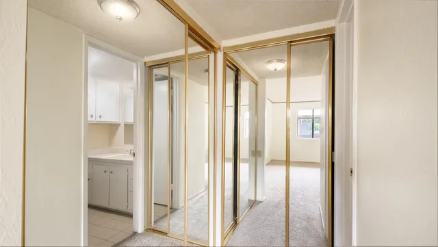 a view of a bathroom with a glass door
