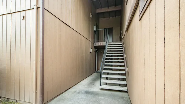 a view of entryway with stairs