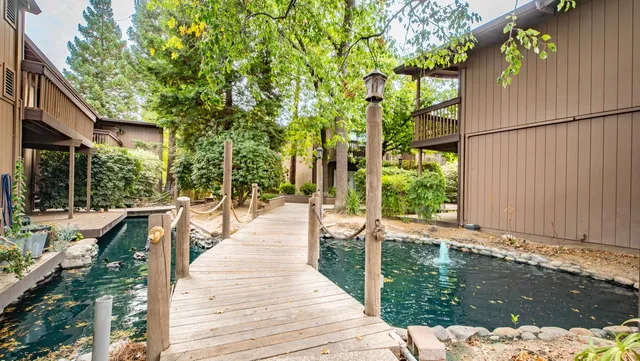 a view of a house with backyard