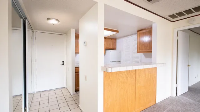 a bathroom with a tub and shower