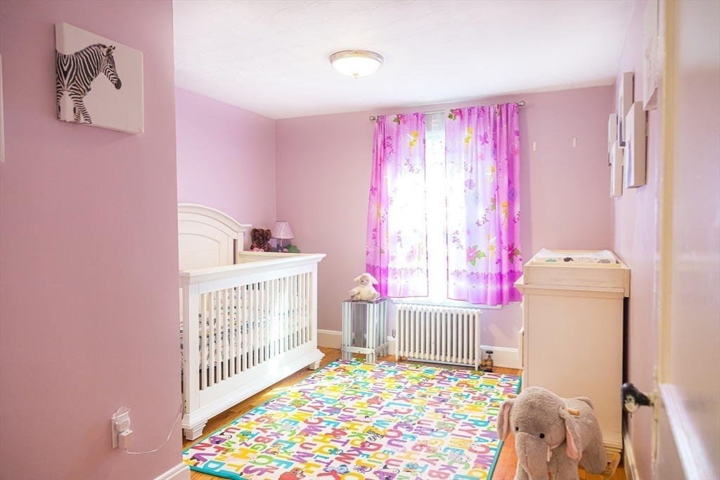 6 Ralph Road Marblehead, MA 01945 - Photo 15 of 29 a bedroom with a bed and a window