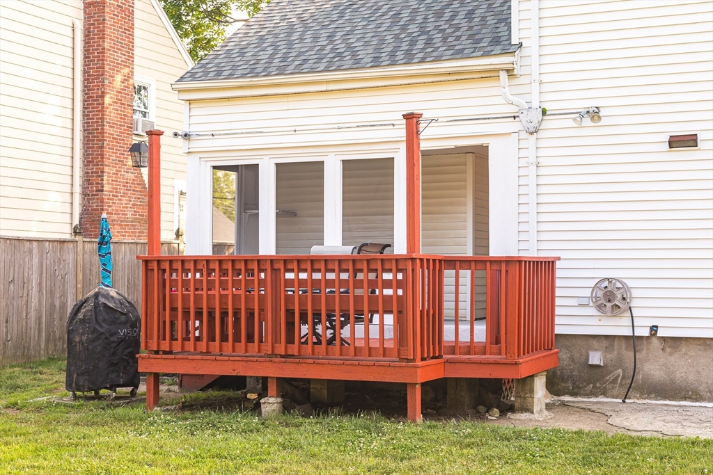 6 Ralph Road Marblehead, MA 01945 - Photo 26 of 29 a view of a deck with chair and floor to ceiling window