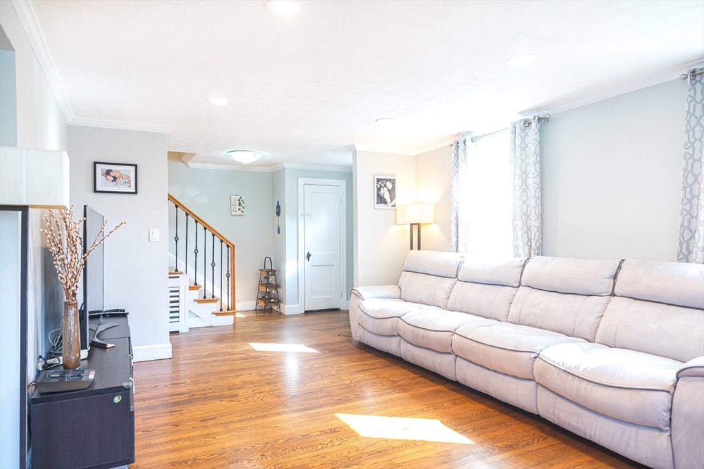 6 Ralph Road Marblehead, MA 01945 - Photo 3 of 29 a living room with furniture and a flat screen tv