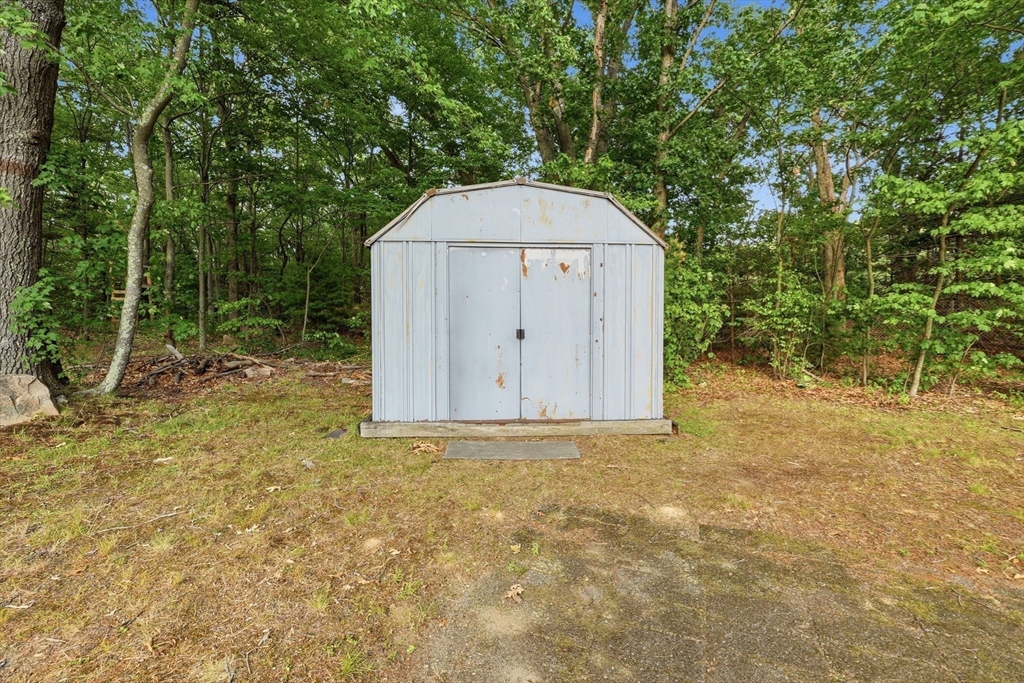 28 Spring Road Westborough, MA 01581 - Photo 33 of 42 a view of backyard with green space