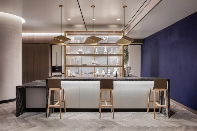 a kitchen with a table and chairs