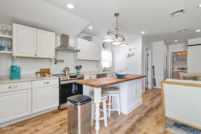 a bathroom with a toilet a sink and a mirror
