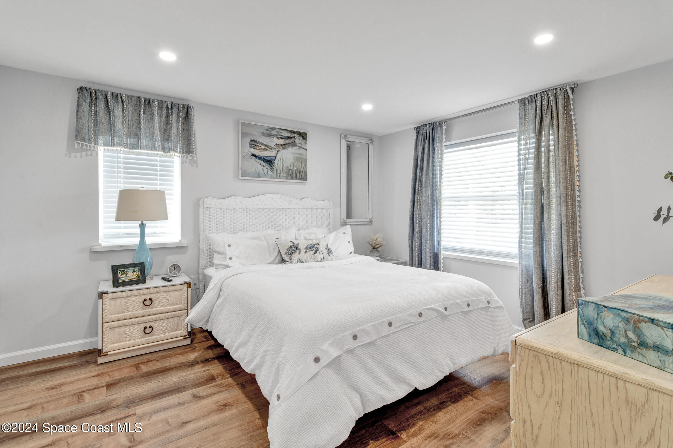 4055 Palm Avenue Micco, FL 32976 - Photo 21 of 58 a bedroom with a bed and a window