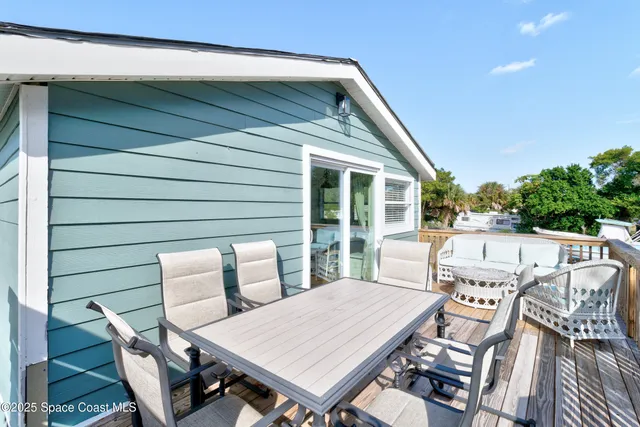 an aerial view of house with yard