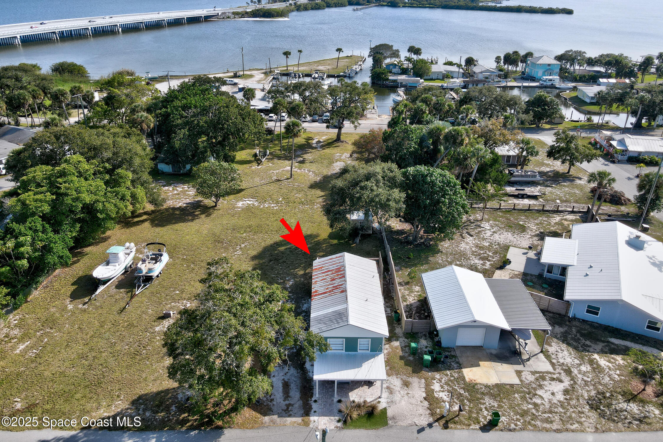 4055 Palm Avenue Micco, FL 32976 - Photo 53 of 58 an aerial view of house with yard