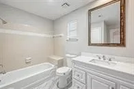 a bathroom with a sink a toilet and a bathtub