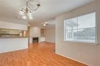a view of a livingroom with a large window