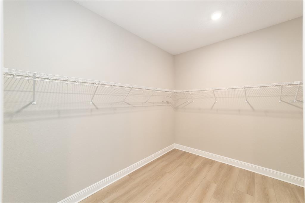 10305 Southwest 105th Street Ocala, FL 34481 - Photo 28 of 44 a view of a room with racks on the wall