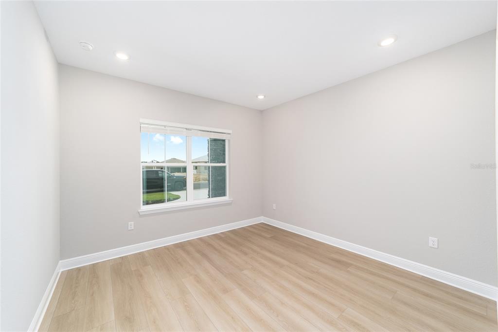 10305 Southwest 105th Street Ocala, FL 34481 - Photo 32 of 44 an empty room with a window