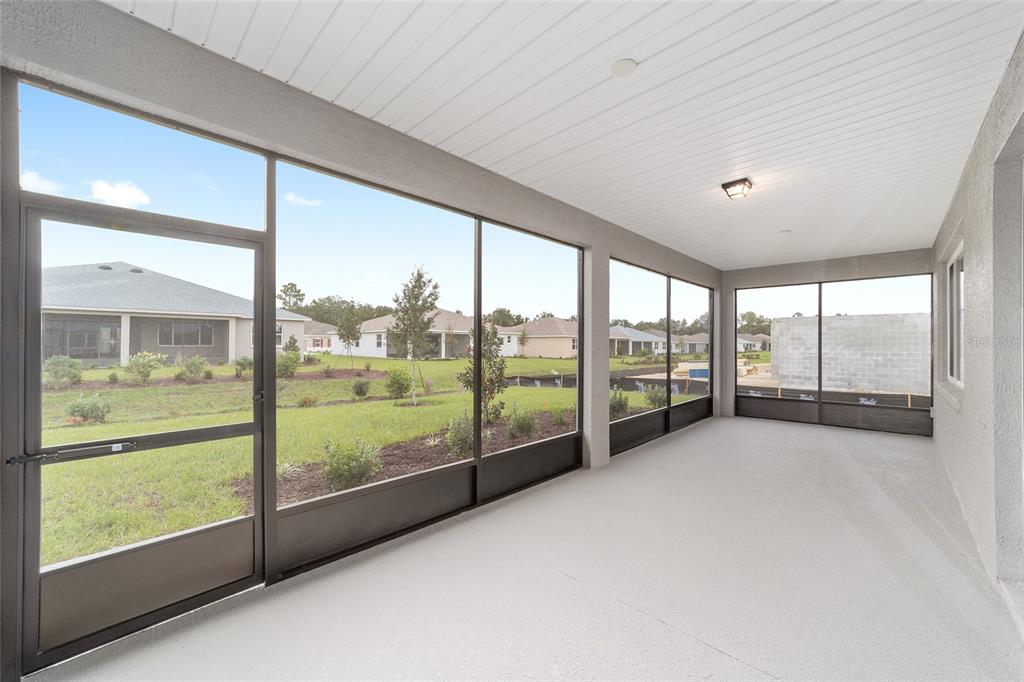 10305 Southwest 105th Street Ocala, FL 34481 - Photo 38 of 44 a view of an empty room with windows and city view