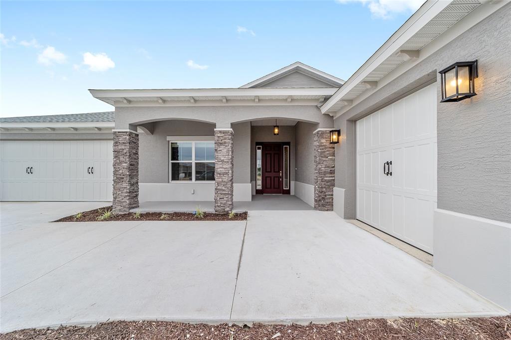 10305 Southwest 105th Street Ocala, FL 34481 - Photo 7 of 44 a front view of a house