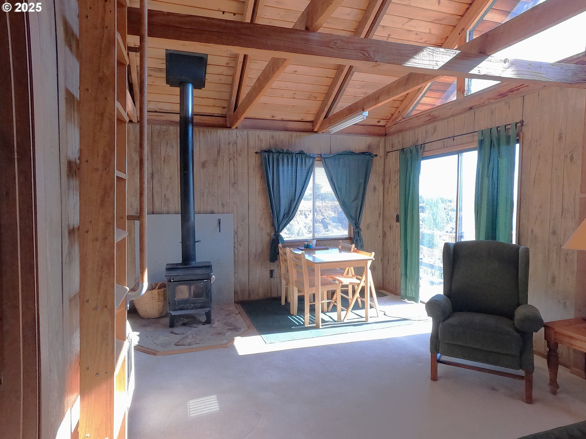 11195 Southwest Yucca Flats Lane Culver, OR 97734 - Photo 11 of 25 a living room with furniture and a fireplace