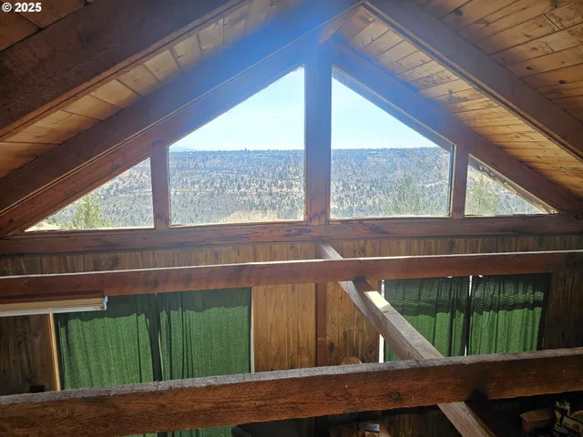 a view of balcony with two chairs