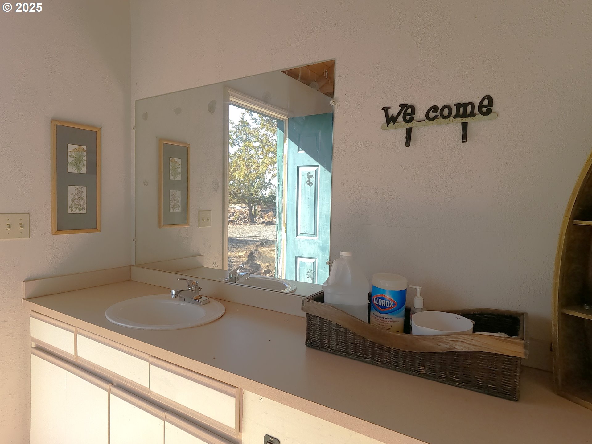 11195 Southwest Yucca Flats Lane Culver, OR 97734 - Photo 23 of 25 a bathroom with a granite countertop sink and a mirror