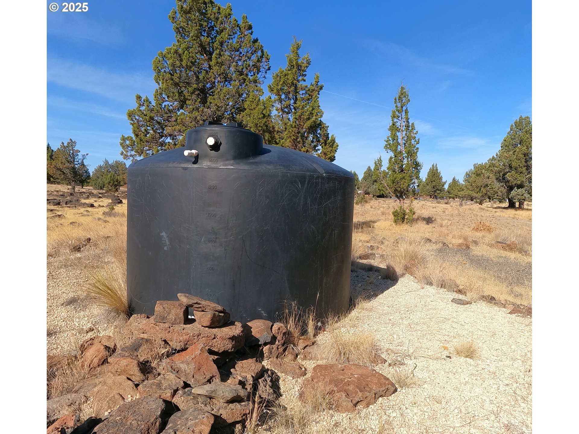 11195 Southwest Yucca Flats Lane Culver, OR 97734 - Photo 25 of 25 a view of a backyard of the house