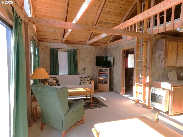 a outdoor living space with furniture and a fireplace