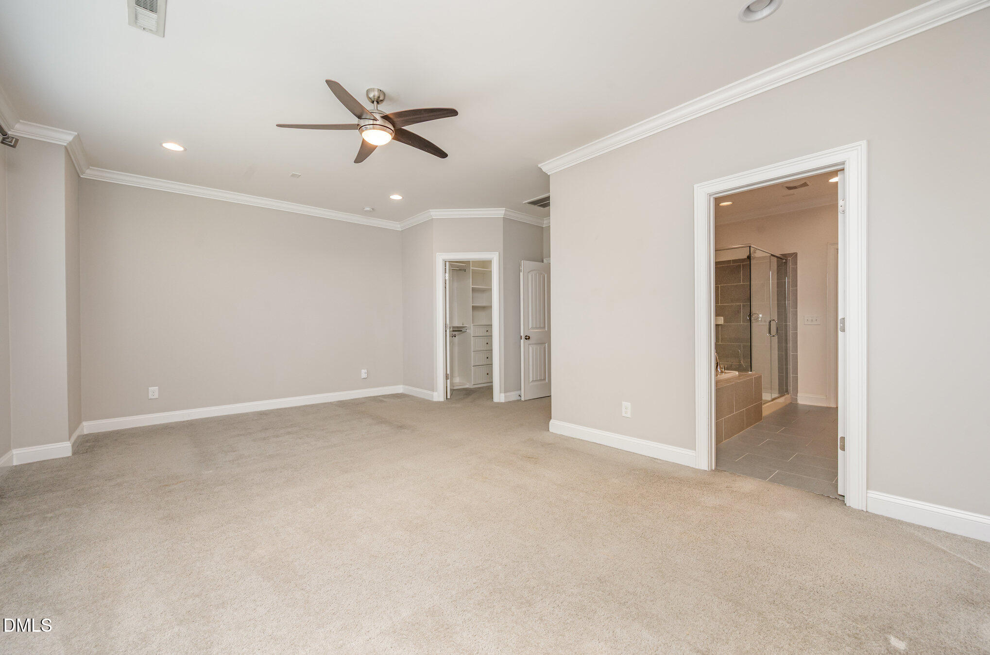 708 Fallon Grove Way Raleigh, NC 27608 - Photo 14 of 27 a view of an empty room with a ceiling fan
