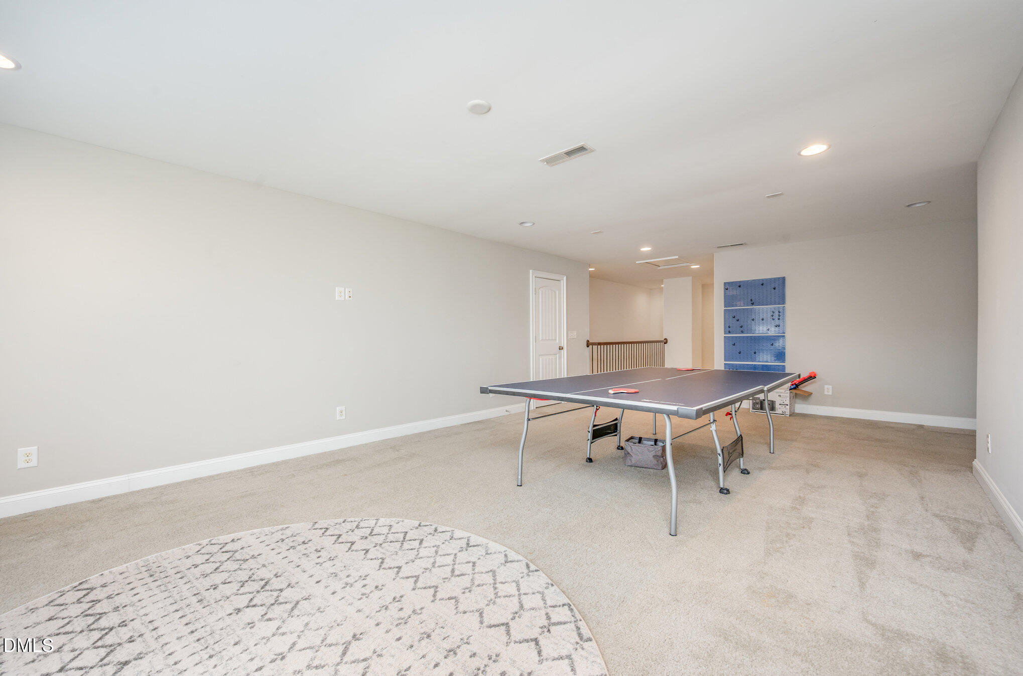 708 Fallon Grove Way Raleigh, NC 27608 - Photo 21 of 27 a room with furniture and a rug
