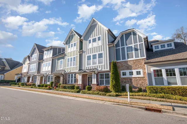 a front view of a building with a street