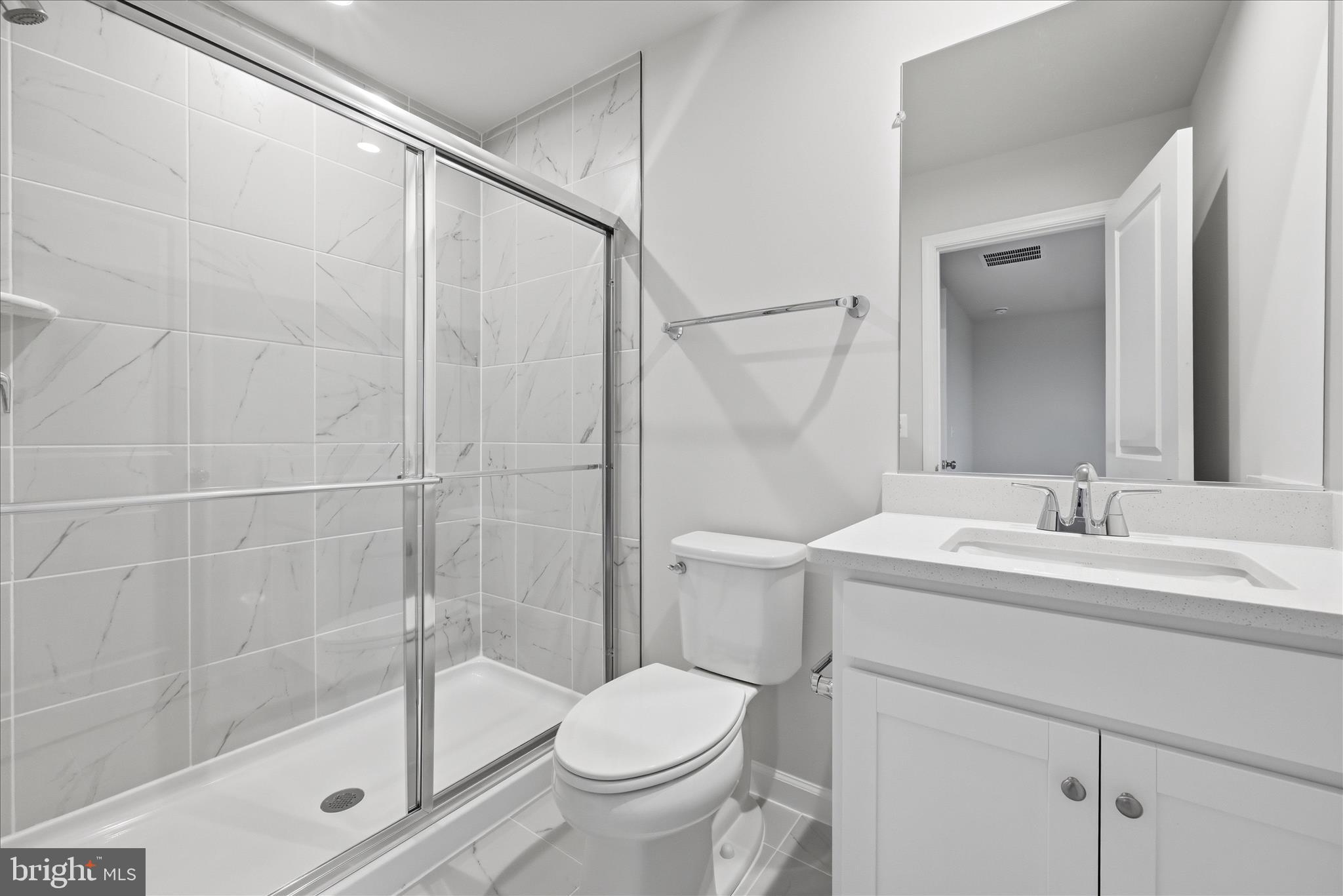 300 Presidents Pointe Avenue Ranson, WV 25438 - Photo 22 of 24 a bathroom with a sink toilet and shower