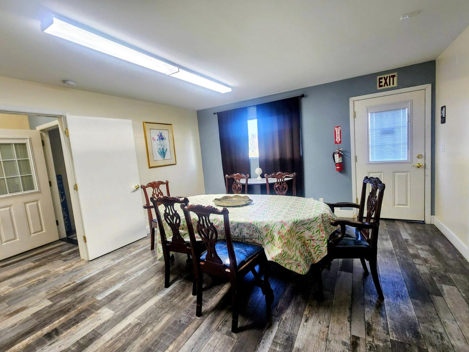 1333 Highway 174 Colfax, CA 95713 - Photo 15 of 88 dining space with dark vinyl plank finished floors and baseboards in suite 200 Valley View Center