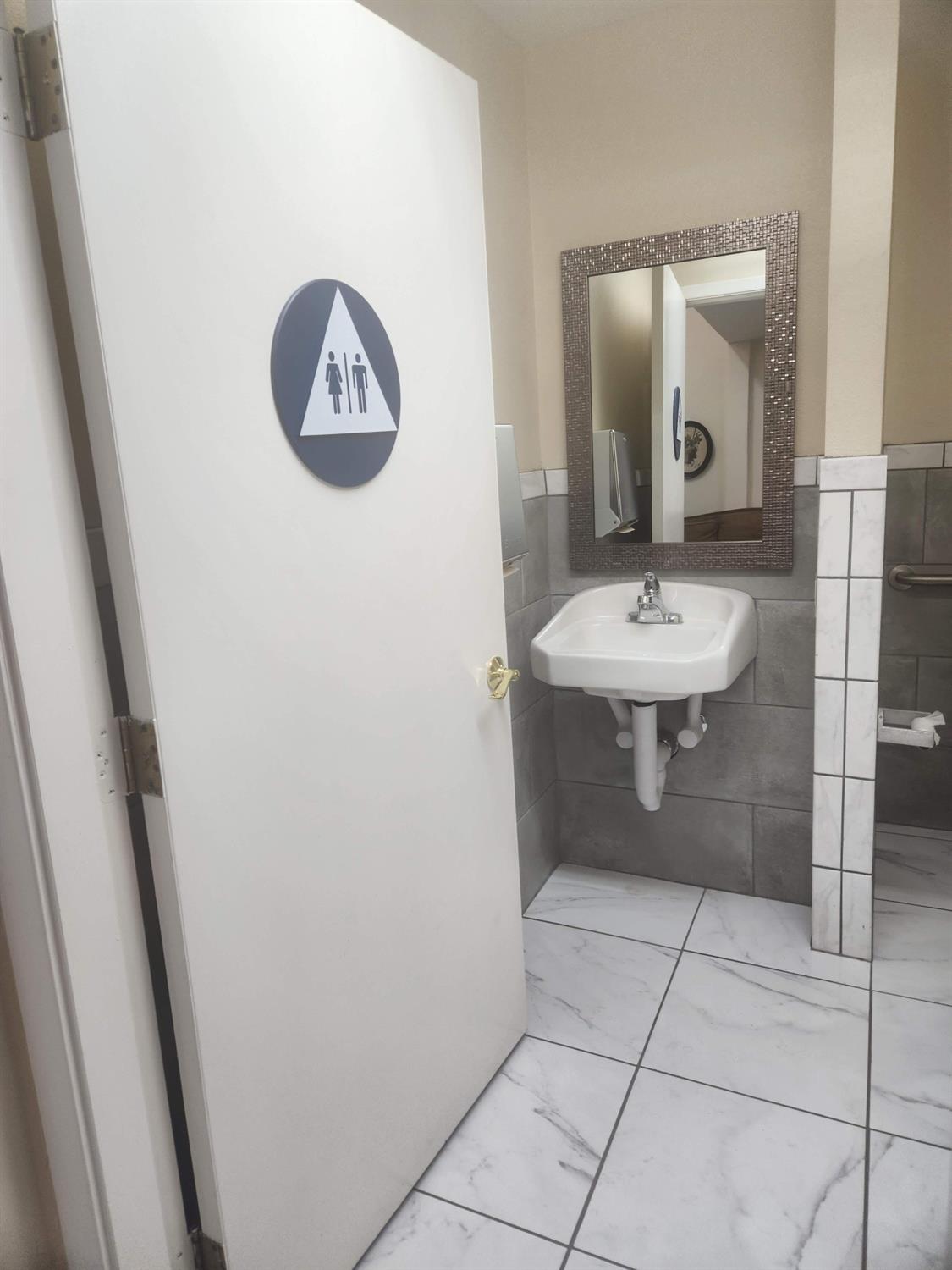 1333 Highway 174 Colfax, CA 95713 - Photo 84 of 88 a bathroom with a sink a mirror and vanity