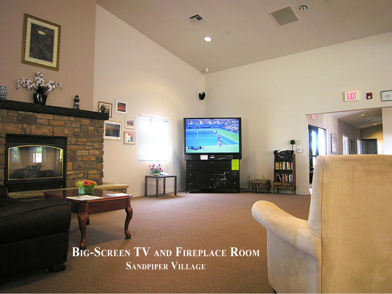 3950 Via Real, Unit SPC 256 Carpinteria, CA 93013 - Photo 19 of 25 a living room with furniture and a fireplace