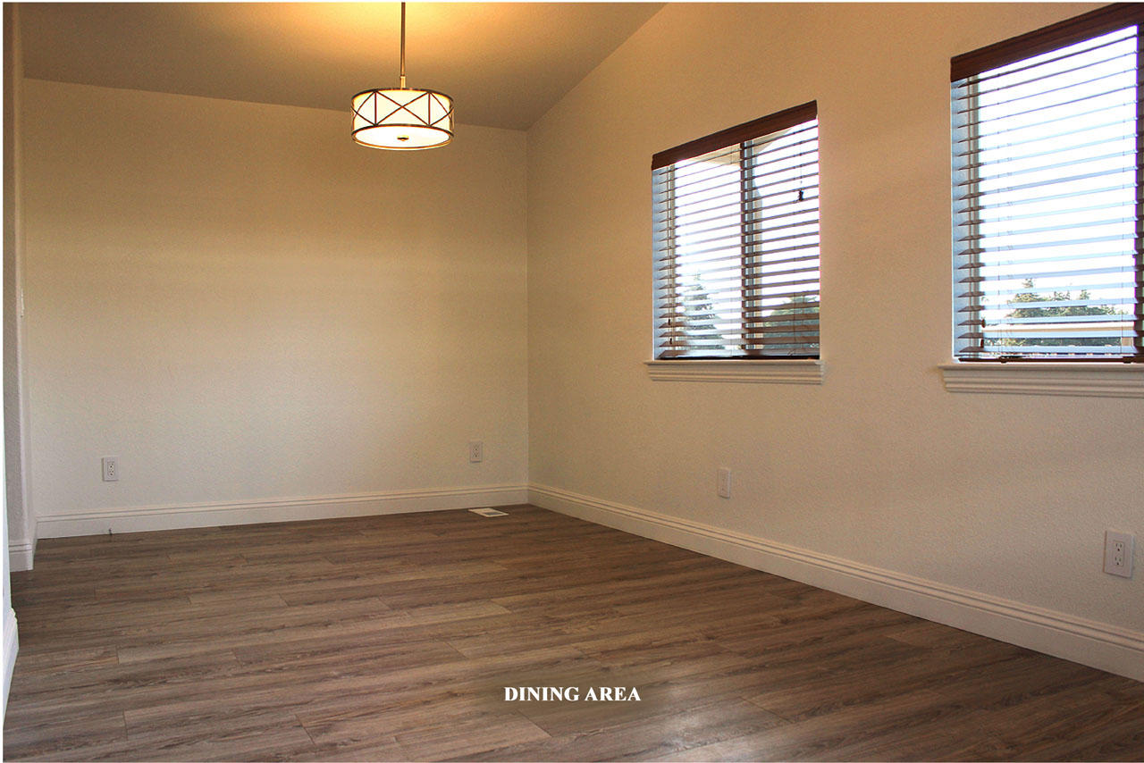 3950 Via Real, Unit SPC 256 Carpinteria, CA 93013 - Photo 2 of 25 an empty room with wooden floor and windows