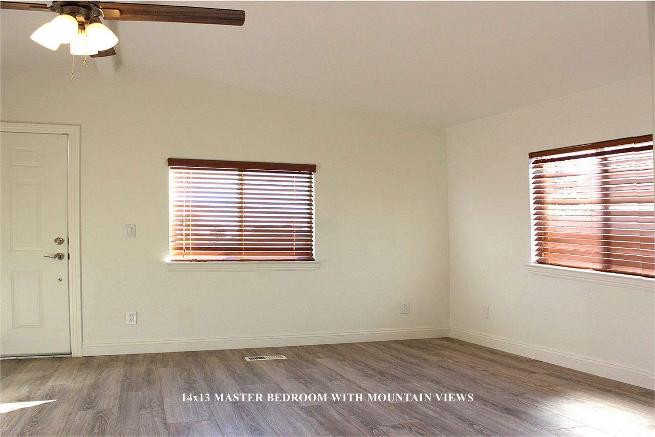 3950 Via Real, Unit SPC 256 Carpinteria, CA 93013 - Photo 4 of 25 a view of an empty room with wooden floor and a window