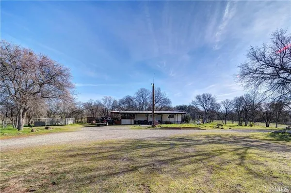 a view of a swimming pool with an outdoor space and seating area