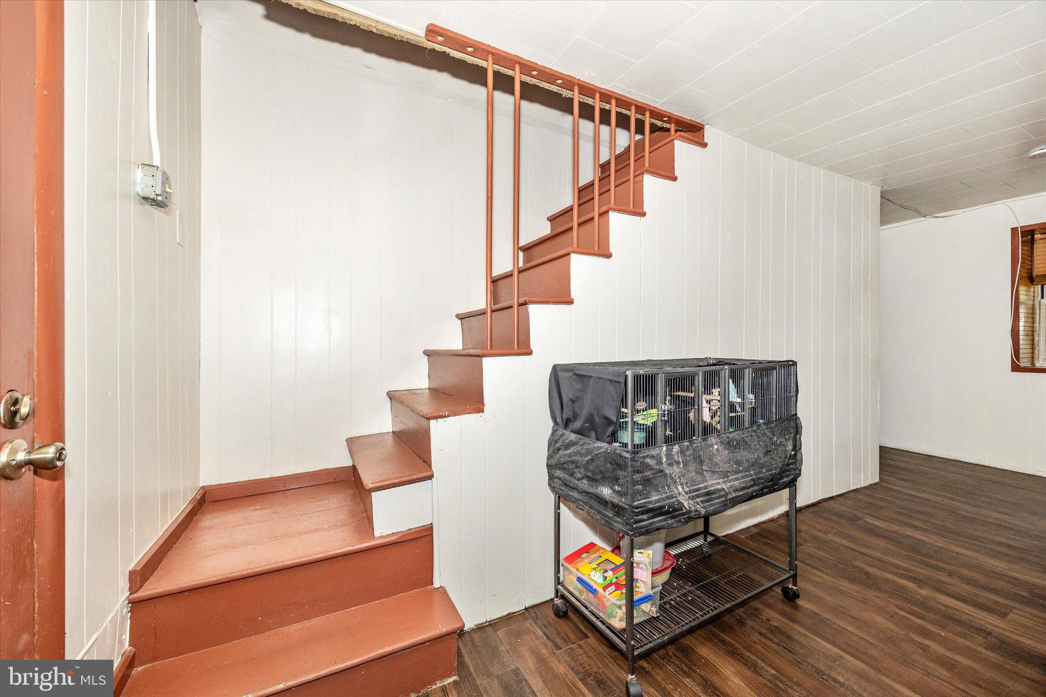 14721 Albert Staub Road Thurmont, MD 21788 - Photo 15 of 46 a living room with wooden floor and furniture