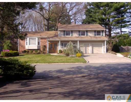 33 Clive Hills Road Edison, NJ 08820 - Photo 1 of 10 a front view of a house with a yard