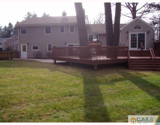 33 Clive Hills Road Edison, NJ 08820 - Photo 2 of 10 a view of a house with a backyard