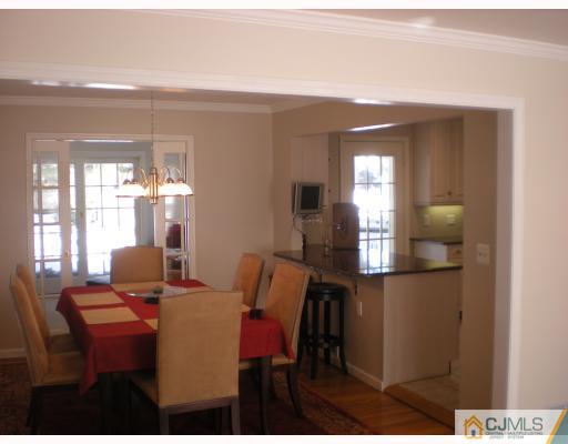 33 Clive Hills Road Edison, NJ 08820 - Photo 9 of 10 a dining room with furniture and window