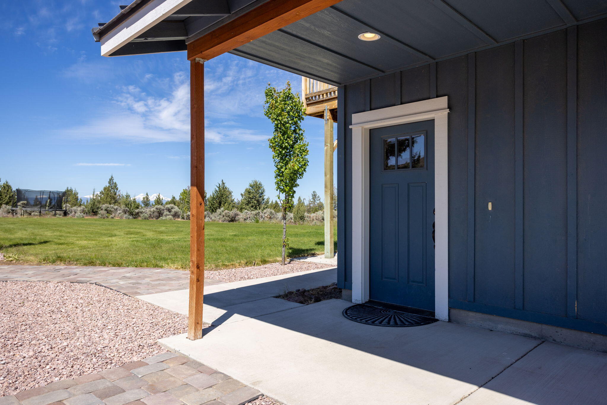 14224 Southwest Howlett Drive Powell Butte, OR 97753 - Photo 19 of 45 Covered entrance door