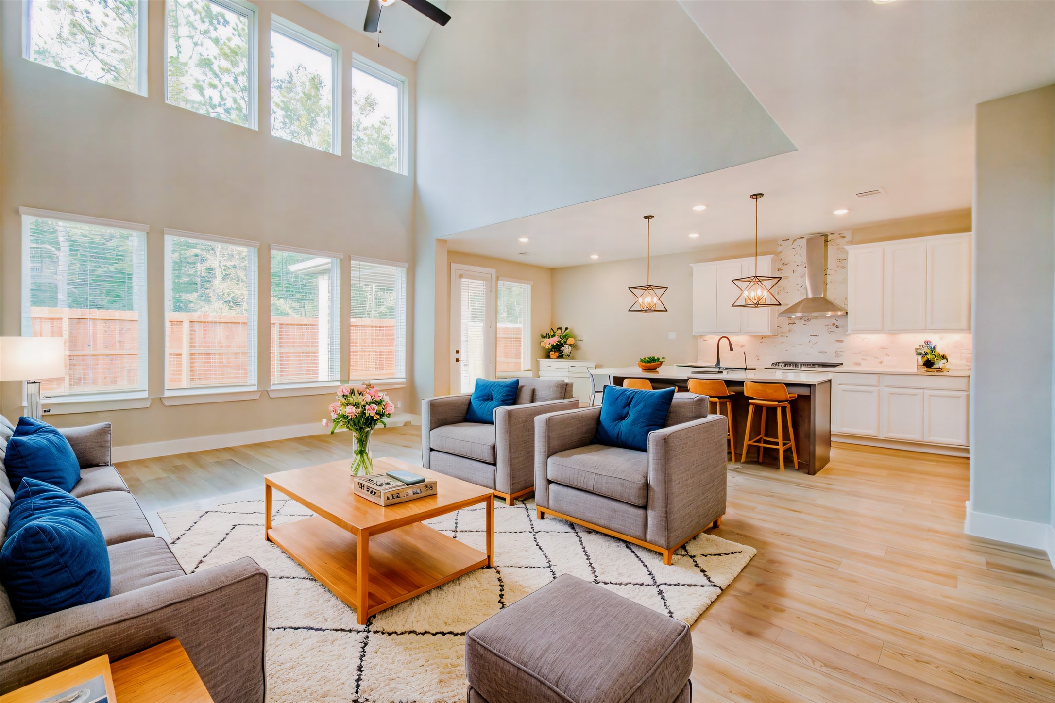 9950 Wild Indigo Circle Conroe, TX 77385 - Photo 11 of 50 a living room with furniture and kitchen view